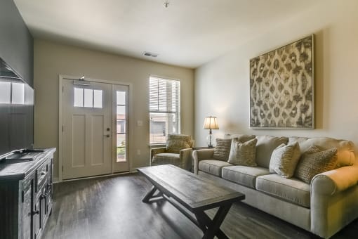 a living room with a couch and a coffee table