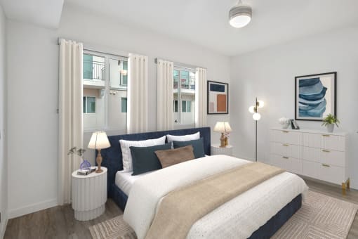 a bedroom with a bed and a window with white curtains