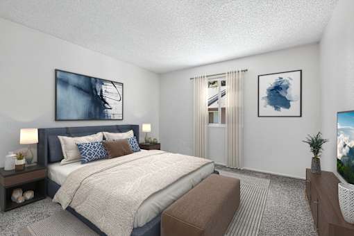 Second Bedroom in Bent Tree 2 Bed 1 Bath apartment home with carpeted flooring and large window allowing for gorgeous natural lighting.