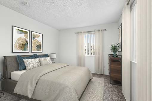Bedroom in 2 Bed 2 Bath Bent Tree apartment with plush carpeted flooring and two large windows.