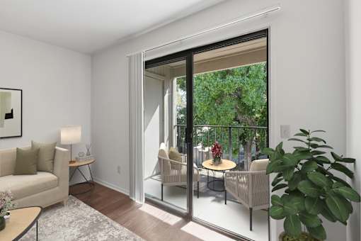 A living room with a sliding glass door leading to a balcony.