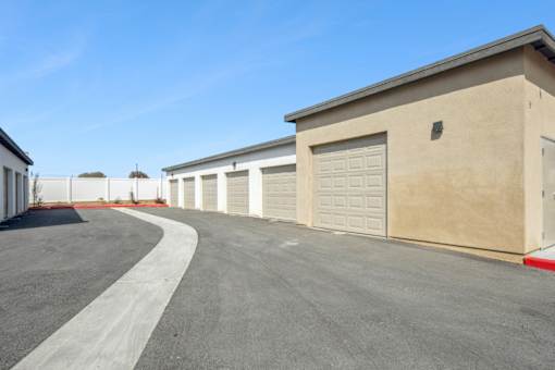 Detached garages with multiple enclosed parking spaces at Altitude Apartments, Moreno Valley, CA 92553