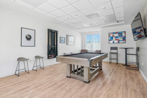 Game room with pool table and dart board at Altitude Apartments, Moreno Valley, 92553