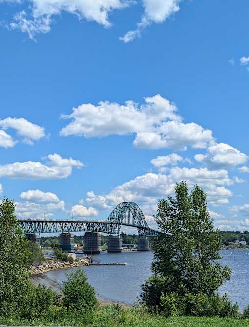 a view of a bridge over a body of water