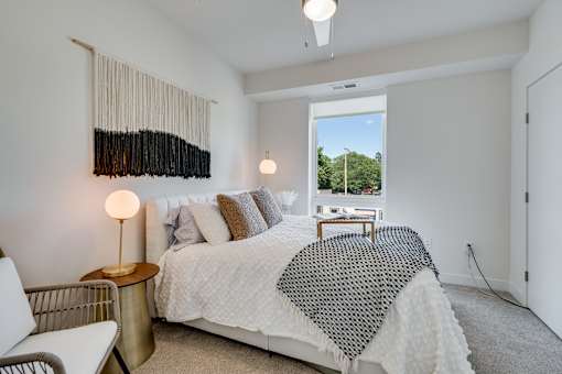 bedroom with a large bed and a chair at The Shale, Minnesota