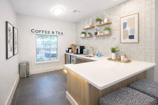 A coffee and tea cafe with a counter and a window.
