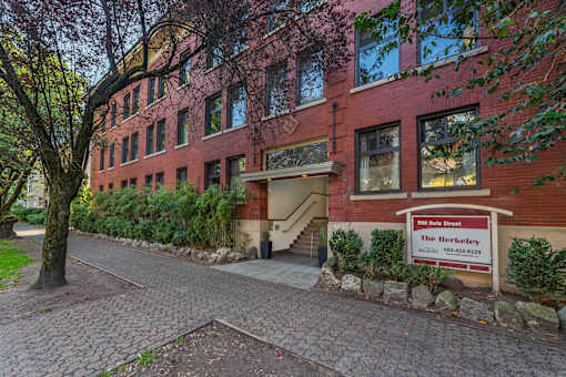 A red brick building with a sign that says "The Berkeley".