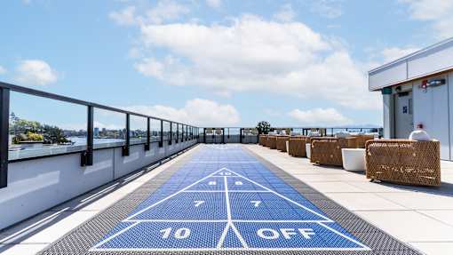 A blue running track with the numbers 7, 10 and OFF painted on it.
