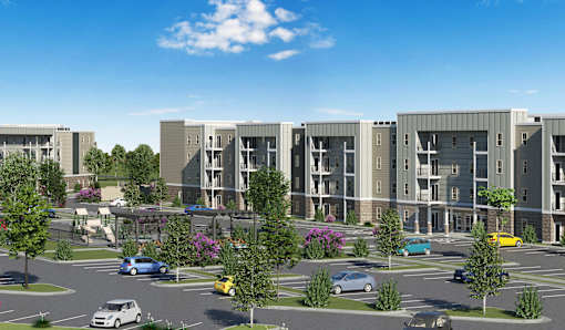 an aerial view of an apartment complex with cars in a parking lot