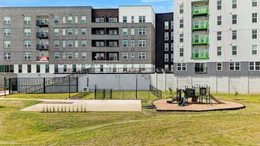 Outdoor playground and community courtyard at Union at Rivers Edge Apartments, Des Moines