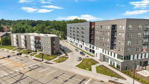 Aerial view of contemporary apartment community with courtyard 1 at Union at Rivers Edge Apartments, Iowa