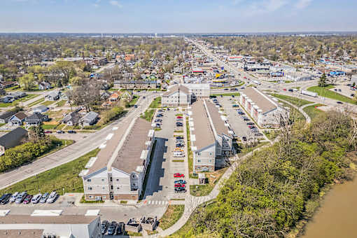 A bird's eye view of a town with a river running through it at Union at 16th, Indianapolis, IN