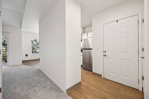 A white door is on the right side of the image.