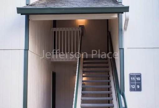 A staircase with a sign that says 11 10 and 12 9.