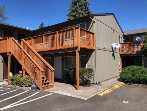 a building with a wooden deck on the side of it