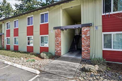 A red and beige building with a number 20 on the front.