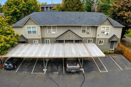 a new roof on a house in a parking lot