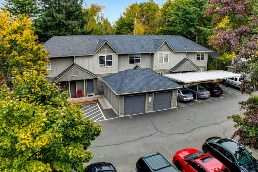 a view of a house from the roof of a parking lot