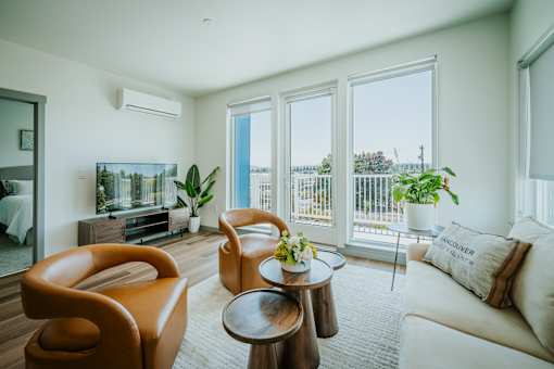 Grand Vista Apartments Living Room with Large Windows