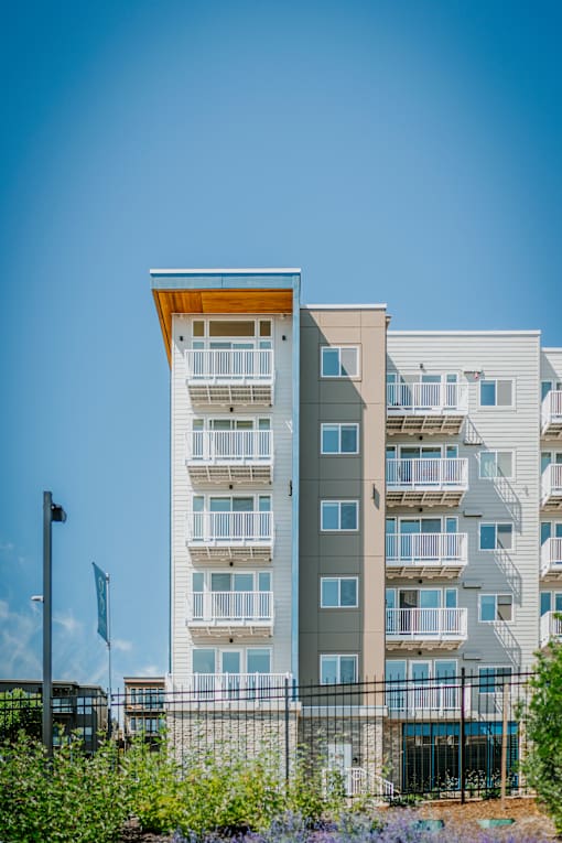 Grand Vista Apartments Exterior Building with Balcony Views