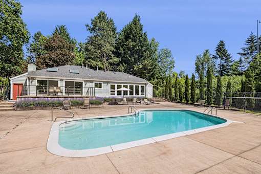 A house with a pool in the backyard.