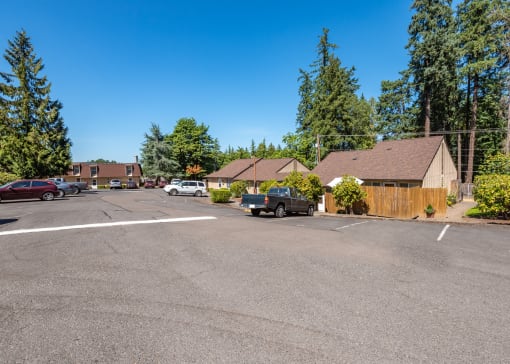 a parking lot in front of a house
