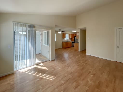 a kitchen and living room in a house