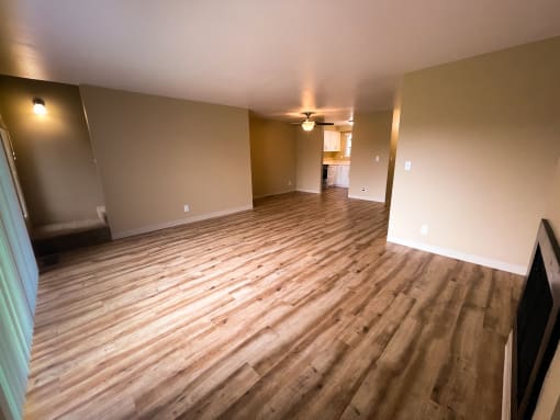a photo of the living room and dining room of a 560 square foot, 1 bedroom apartment