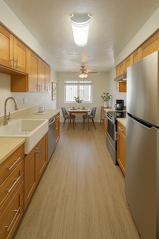 A kitchen with wooden cabinets and a refrigerator.
