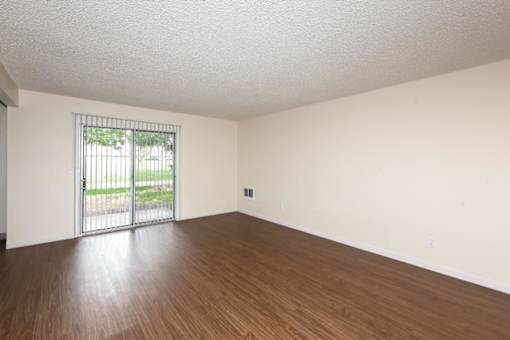 Royal Greens Living Room with Patio View