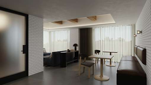 A modern living room with a grey sofa, a wooden table and a black chair.