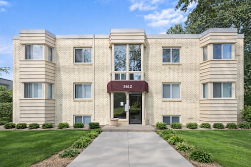The image shows a building with the number 3612 on it.