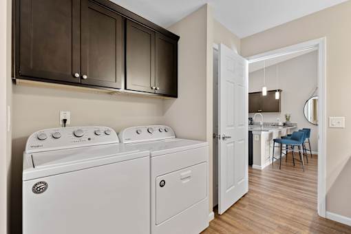 A laundry room with a washer and dryer.