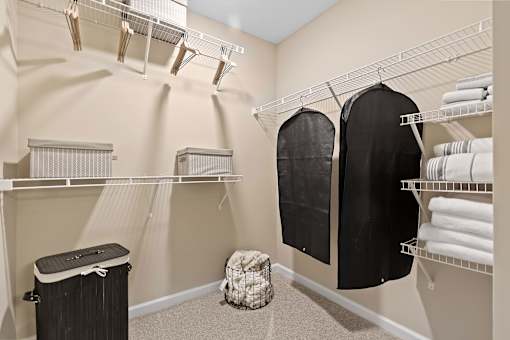 A laundry room with clothes hanging on a clothesline.