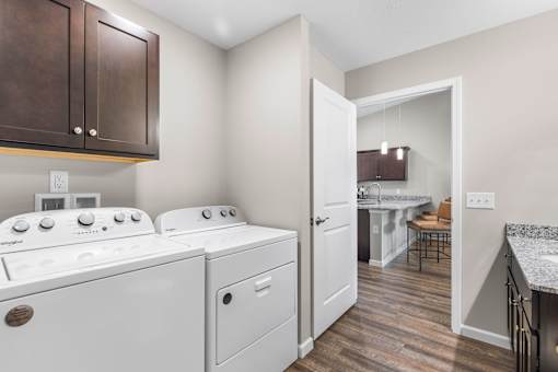 A laundry room with a washer and dryer.