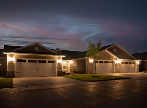 Waukee IA Apartment Rentals Redwood Waukee Douglas Parkway Exterior at Dusk