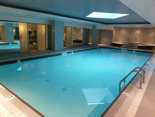 a large swimming pool in a large room