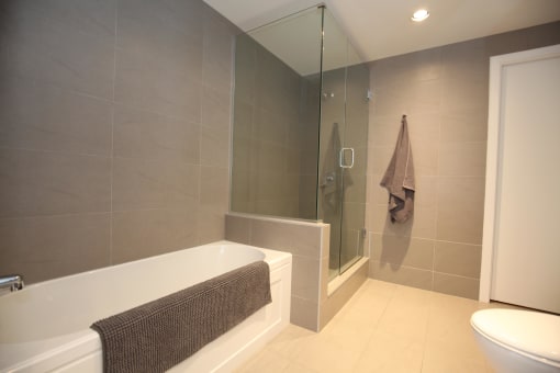 first floor : bedroom has an en suite with bath and shower