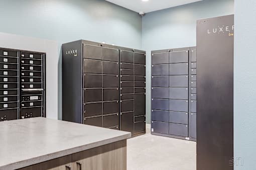 a room with lockers and a counter with a counter top