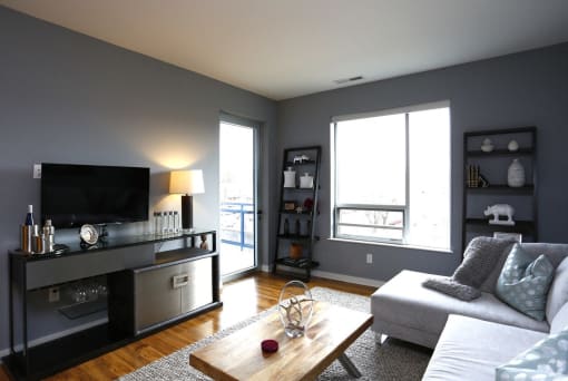 a living room with a couch and a tv
