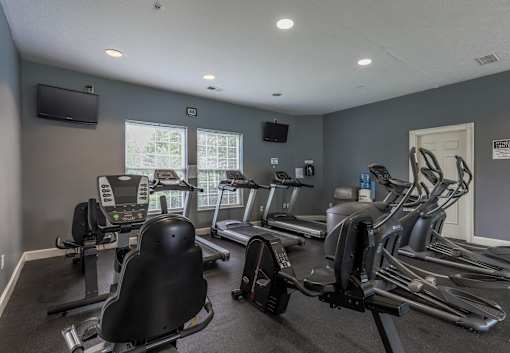A gym with treadmills, and exercise bikes at Twin Fountains Apartments, Mason, 45040