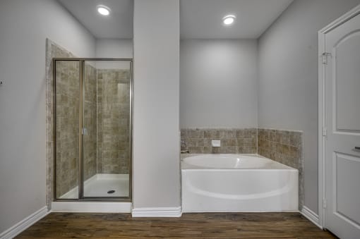 Large Soaking Tub In Bathroom at Riachi at One21, Plano, Texas