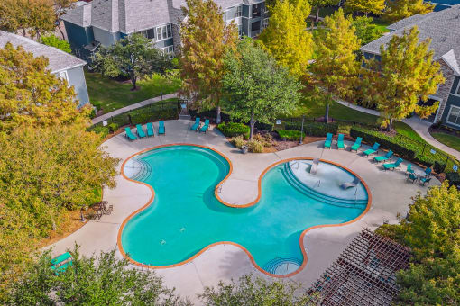 Swimming Pool aerial view And Relaxing Area at Riachi at One21, Plano, 75025