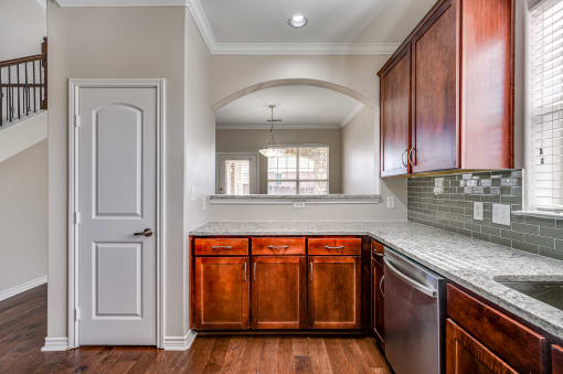 Kitchen With Ample Storage at Riachi at One21, Texas