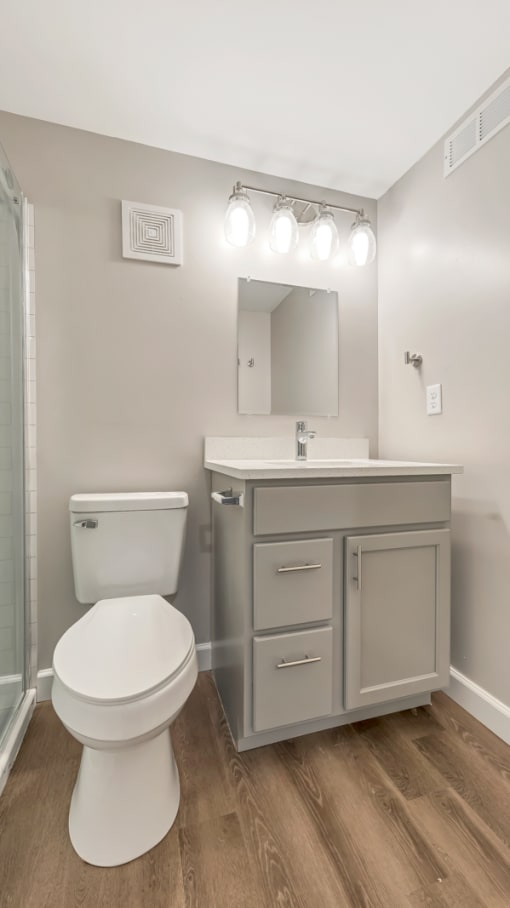 a bathroom with a toilet and a sink at Park 44, Missouri