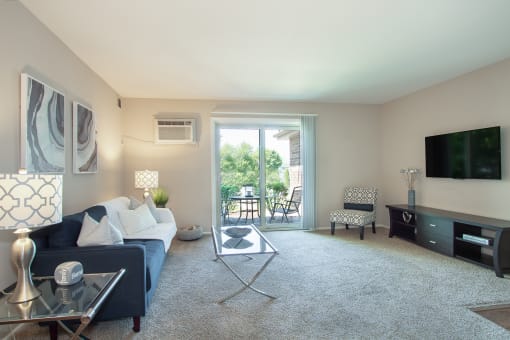 Living Room with patio or balcony at The Greenway  at Carol Stream, Carol Stream Illinois 60188