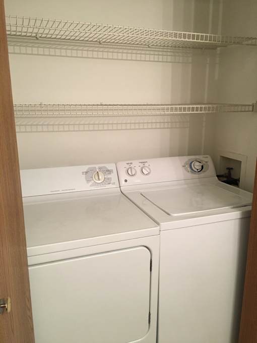 A white oven with a control panel on the front.
