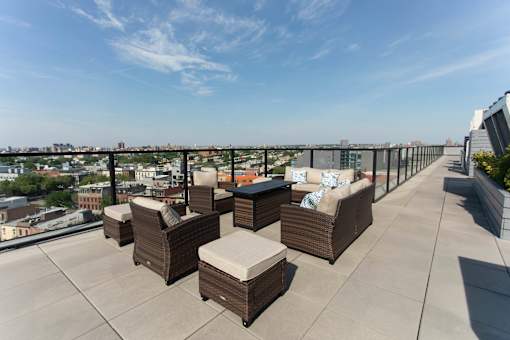 Rooftop terrace with panoramic skyline views at 1134 Fulton Street Apartments, Brooklyn, NY