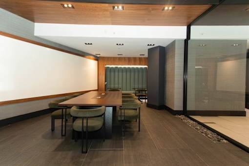 Private dining room with upholstered banquette seating at 1134 Fulton Street Apartments, Brooklyn, NY 11216