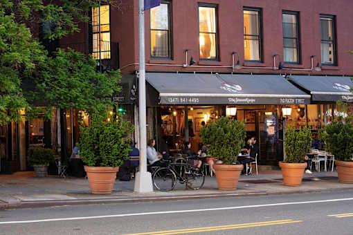 a street view of a restaurant on a city street at The Paxton, Brooklyn, NY 11201